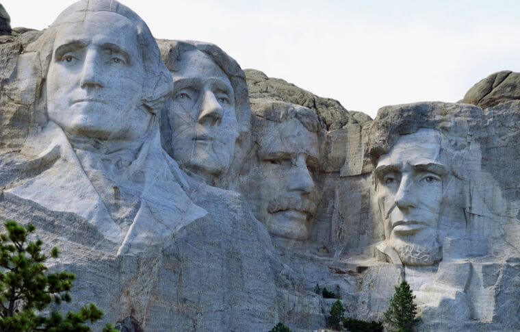 Four presidents carved into the rock at Mount Rushmore.